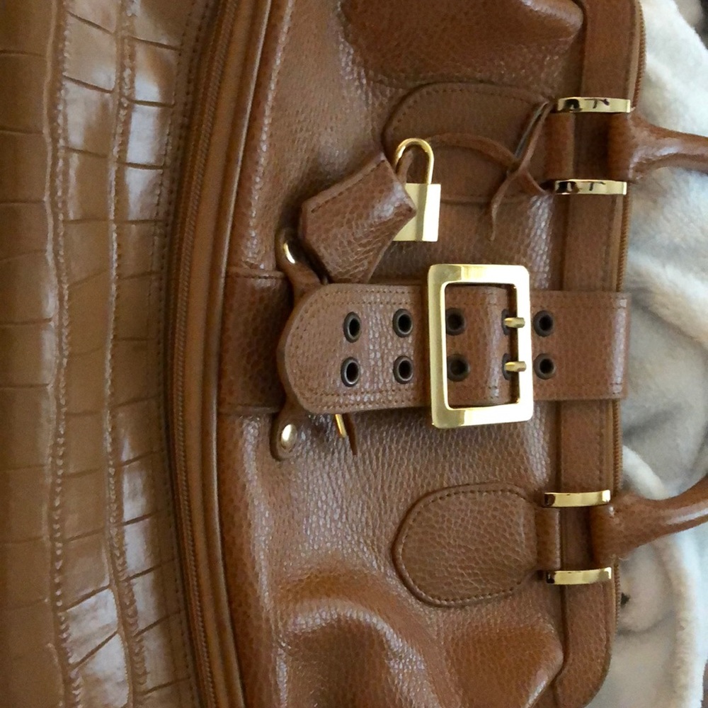 The Find tan and gold purse